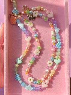 Riice jewelry is here to make you smile. #dopaminedressing #kidcore #pastelaesthetic #pastel #rainbowjewelry #rainbows #complementarycolors #chunkyrings #chunkyjewelry #pastelvibes #rainbownecklace #flowers #flowerring #floraljewelry #shopsmall #pastelnails #pastelcolors #greenandpink #daisies #pearlrings #pearljewelry Vintage Ice Cream Shop, Playful Jewelry, Rotterdam Netherlands, Stone Bead Jewelry, Spring Meadow, Vintage Ice Cream, Rainbow Jewelry, Rainbow Necklace, Fun Jewelry