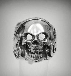 Sterling silver biker ring, skull guitar - 925/1000. Stamped 925.Approximate weight 15.3 grams. Top width 2.2 cm (0.84 inches). All our jewels are made from solid sterling silver 925/1000 and are carefully crafted by hand in our family workshop. We dispatch your orders in 5 working days, worldwide and the postage is $5. We ship registered priority mail. Please allow 5-7 working days for delivery in Europe and 10-15 working days outside Europe. For any questions - please do not hesitate to contac Punk Sterling Silver Skull Ring, Sterling Silver Skull Ring In Punk Style, Silver Skull Ring For Streetwear, Silver Punk Skull Ring, Silver Skull Ring For Halloween Streetwear, Silver Skull Ring For Biker Events And Halloween, Silver Skull Ring Punk Style, Silver Punk Rings With Skull Print, Silver Skull Ring In Punk Style