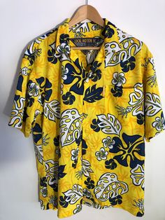 Vintage Yellow Mesh Local Motion Hawaiian Shirt With Leaf Print Made in Hawaii Yellow, Blue and white Leaves 100% Polyester Size Medium Measurements taken while laying flat Neck 6" Pit to Pit 23" Sleeves from pit to edge 7" Length from shoulder to bottom 29" Purchase price includes free shipping in Canada and the USA International shipping is available, please contact before purchase for shipping quote Any questions, just ask! Vintage item, regular wear due to age should be expected Any known fl Affordable Yellow Hawaiian Shirt With Graphic Print, Cheap Yellow Cotton Hawaiian Shirt, Cheap Yellow Hawaiian Shirt For Spring, Cheap Yellow Hawaiian Shirt, Affordable Yellow Hawaiian Shirt, Affordable Yellow Cotton Hawaiian Shirt, Cheap Yellow Collared Hawaiian Shirt, Cheap Yellow Hawaiian Shirt With Relaxed Fit, White Leaves