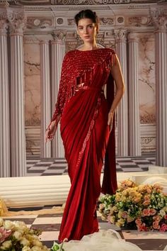 Red pre-draped saree with placement scallop trimmed embroidery. Paired with a blouse and belt. Comes along with an asymmetric cape with sequins butti embroidery and scallop trims, elevated with stone danglers. - Aza Fashions Festive Floor-length Dupatta With Draped Sleeves, Festive Embellished Pre-draped Saree, Formal Pre-draped Saree With Zari Work, Formal Saree With Draped Sleeves And Traditional Drape, Evening Dupatta With Cutdana And Draped Style, Traditional Drape Saree With Draped Sleeves For Diwali, Red Draped Georgette Saree, Evening Draped Dupatta With Cutdana, Diwali Saree With Draped Sleeves And Traditional Drape