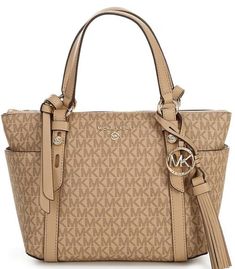 Michael Kors, the Sullivan Signature Logo Small Convertible Top Zip Tote Bag features: PVC/Polyester/PU Gold hardware Top zip closure Interior: 1 back zip pocket, 1 front slip pocket Exterior: 2 side slip pockets Removable strap Approx. 12.5" W x 7.5" H x 4.5" D bag; 5" handle drop; 20.5" - 24.5" adjustable strap drop Approx. weight 1.08 lbs. Expensive Purses, Michael Kors Handbags Outlet, Metallic Gold Color, Small Tote Bag, Convertible Top, Monogram Tote, Zip Tote, Small Tote, Camel Color