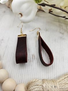 Beautiful, fun genuine leather earrings. Perfect for everyday wear or special occasions. You will love these trendy, genuine leather earrings. Each pair is handmade by us with lead free, stainless steel hooks. They hang at approximately 2.5 inches for the perfect everyday look. All earrings may vary slightly due to leather patterns. Colors may vary slightly due to screen variations. Trendy Brown Jewelry With Ear Wire, Handmade Brown Earrings For Everyday Use, Trendy Brown Jewelry With Leather Strap, Trendy Brown Leather Jewelry, Trendy Leather Jewelry With Leather Strap, Trendy Brown Jewelry For Everyday Use, Nickel Free Brown Earrings For Everyday Use, Trendy Handmade Earrings For Everyday Use, Nickel-free Drop Earrings For Everyday