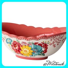 a large bowl with flowers painted on it