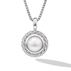 David Yurman's gifts from nature, the lustrous beauty of pearls has always inspired our timeless designs. Sterling silver South sea white pearl, 13mm Pave-set diamonds, 0.37 total carat weight Amulet, 18.8 x 18.8mm Functioning bail allows amulet to attach to a necklace or bracelet. Style Number:D18377D88DSWDI Timeless White Pearl Necklace With Diamond Accents, Luxury Pearl Necklace In White Gold, Luxury White Gold Pearl Necklace With Gemstone, Luxury White Gold Pearl Gemstone Necklace, Jewelry Roll, Bracelet Style, David Yurman, White Pearl, Free Jewelry