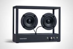 a black speaker with two speakers attached to the front and side of it's enclosure