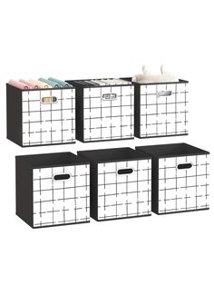 three black and white storage bins with drawers on each side, one is filled with items