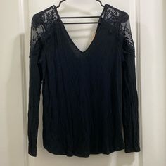 American Eagle, Medium Black Long Sleeve Vneck Top With Lace Shoulders. Back Of Top Also Has A Vneck With A Strap Across The Top. New With Tags Bell Sleeve Shirt, Flannel Tops, Cowl Neck Top, Tie Dye Long Sleeve, Purple Lace, Flowy Tops, V Neck Tops, White Long Sleeve, Black Long Sleeve