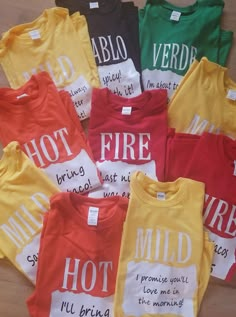 a group of children's t - shirts with words printed on them