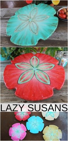 four different colored plates sitting on top of a wooden table with flowers painted on them