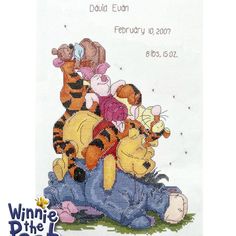 the winnie the pooh cross stitch pattern has been made to look like it is being hugged