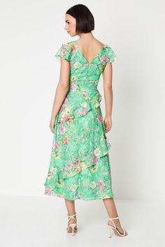 Flirty floral satin burnout dress with a vibrant green base adorned with pink blooms
Flattering V-neckline with frilled cap sleeves adding a feminine touch
Midi length with a flared skirt creating an elegant, swishy silhouette
Lightweight satin fabric drapes beautifully for a flowing look
Concealed back zip fastening for a seamless finish
Radiate confidence and charm in this eye-catching floral dress from Oasis. The vibrant green and pink hues make it perfect for special occasions like weddings, garden parties or summer soirees. Style it with strappy heeled sandals and a clutch for a glamorous yet effortless look that will turn heads. The midi length and flared skirt create a flattering, feminine silhouette that moves gracefully with every step. Wedding Guess Dress, Midi Wedding Guest Dress, Wedding Guess, Dresses Occasion, Radiate Confidence, Oasis Dress, Summer Soiree, Oasis Fashion, Guess Dress