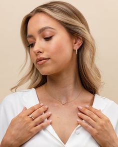 Our open heart pendant is a timeless expression of love. It’s the sweetest gift for yourself or for someone you hold close to show them just how much you care for them. With sparkling cubic zirconia and a dainty chain, this piece is perfectly flirty and feminine. 14KT yellow, rose or white gold platedAAAAA Cubic ZirconiaMeasurements: Diameter: 8mm (.3”)Chain length: 18”+2” extender Expression Of Love, Open Heart Necklace, Dainty Chain, Sweet Gifts, Open Heart, Rose Gold Necklace, Yellow Rose, Chain Lengths, Chain Length