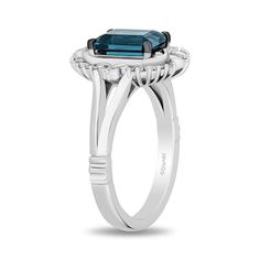 a ring with an oval cut blue topazte