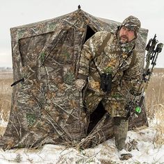 Bag more birds or get the drop on that trophy buck with a little help from the Plano Ameristep Outdoor 2 Person Care Taker Kick Out Hunting Blind. This hunting blind tent is the perfect size for 2 hunters at once, providing plenty of space to keep you hidden in the brush. The duck hunting blind tent is woven from Durashell Plus fabric that protects you from wind, sun, and rain. A matte camouflage finish provides cover that's impossible to see from the untrained eye and features a ShadowGuard coa Duck Hunting Blinds, Care Taker, Ground Blinds, Deer Hunting Blinds, Sun And Rain, Hunting Blinds, Duck Hunting, Deer Hunting, Camouflage