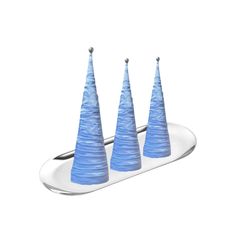 three blue cones sitting on top of a white tray with silver handles and metal tips