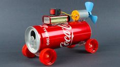 a red can with a radio on top of it