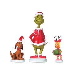 three christmas figurines are shown on a white background