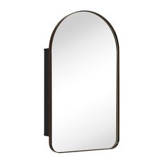 an oval mirror hanging on the wall with a black frame and dark wood trimming