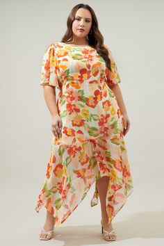 Take on the day in this spritely floral midi dress. A spirited floral print with silver pinstriping is woven into a sheer and flowy fabric. It shapes the Aerin Midi, a flowy dress with sheer, flouncy sleeves frame a lined bodice and asymmetrical skirt. An imbalanced hemline creates an ethereal touch. An elastic waistband is placed along the back side, as well as a keyhole.- Keyhole- Lined- Asymmetrical hem- Elastic waist- Color: Blush MultiSize + Fit - Model is 5'9" and wearing size 2X- Measurem Flouncy Sleeves, Flowy Fabric, Pinstriping, Color Blush, Asymmetrical Skirt, Flowy Dress, Asymmetrical Hem, Floral Midi Dress, Asymmetric Hem