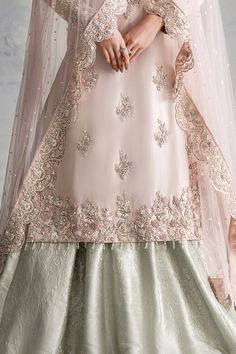 The embellished Nikkah Dress in Lehenga Kameez Style is an elegant masterpiece adorned with Hand-crafted details of Zardosi and Crystals. Fast shipping. Lehenga Designs Embroidery, Light Pink Pakistani Dress, Nikkah Dress Pakistani Simple, Light Pink Nikkah Outfit, Nikkah Dress Pakistani Pink, Pink Nikkah Dress, Simple Bridal Outfit, Bridal Nikkah Dresses, Nikkah Outfit Pakistani Bridal