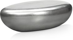 an oval shaped metal object on a white background