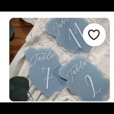 the table numbers are blue and have hearts on them