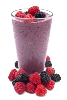 a smoothie with raspberries and blackberries in it