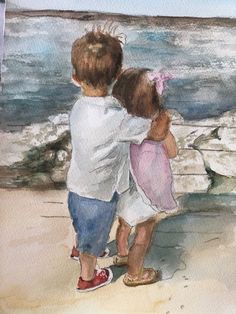 two children are standing on the beach looking out at the water and holding their arms around each other