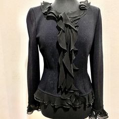 Euc One Owner. Pristine Condition. Sheer Ruffle Neckline And Cuffs Trimmed With Black Embellishments That Create A Beautiful Subtle Sparkle. Front Has Sheer Short Waterfall. True St. John Workmanship. Front Hidden Zipper With Embellished Pull. Slight Shoulder Pads. This Is A Feminine Staple Piece That Will Stand Time. Measurements And Video In Photo Stream. A True Black Color. I Played With The Lighting So The Details Would Show. This Is An Investment Piece. Questions And Offers Welcomed! 2301 Sheer Shorts, Staple Pieces, St John, Hidden Zipper, Shoulder Pads, Sweater Top, Sweaters & Cardigans, Investment, Black Color