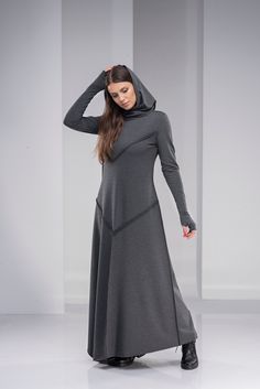 "Plus Size Maxi Dress, Gothic Hoodie Dress, Women Winter Dress ♠ This sleek maxi length dress will easily become your favorite for the season! Featuring a shawl hood, extra long sleeves with thumb-hole cuffs and an asymmetric hem, this piece feels unique, yet minimalist. The soft cotton blend material hugs the body and compliments it at all the right places. ♠ Sizes The model on the picture is wearing size S. Have a look at my Size Chart below to make sure your piece will fit you best. ** PLEASE Boho Winter Dress, Boho Dress Winter, Long Hoodie Dress, Long Sweatshirt Dress, Modest Dresses For Women, Winter Maxi, Modest Maxi Dress, Maxi Dress Winter, Maxi Dress Plus Size