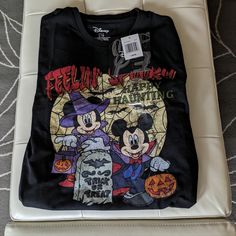 New With Tags,Cute Mickey Mouse And Minnie Mouse Halloween Trick Or Treating T Shirt,With Them All Dressed Up In Custumes Mickey As A Vampire And Minnie As A Witch Sizel Bydisney 60%Cotton 40% Polyester Fun Black Mickey Mouse T-shirt, Themed Black Tops With Cartoon Print, Black Cartoon Print Themed Tops, Black Themed Long Sleeve T-shirt, Halloween Mickey Mouse Crew Neck Top, Fall Mickey Mouse Crew Neck T-shirt, Halloween Trick Or Treating, Mouse Halloween, Mickey Mouse And Minnie Mouse