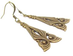 "Beautiful Antiqued Brass Earrings, Art Deco Vintage design. Antiqued Gold Brass, nickel free, made in the USA. 15mm wide (5/8\") at the base. Earrings drop 1-1/4\" below the ear wires. Beautiful earrings, perfect for every day to Wedding Day! Sent to you with Aloha!" Artistic Gold Earrings For Wedding, Artistic Gold Wedding Earrings, Artistic Drop Earrings For Wedding, Artistic Metal Jewelry For Wedding, Artistic Metal Jewelry For Weddings, Antique Gold Teardrop Earrings For Gift, Bronze Drop Earrings For Wedding, Bronze Wedding Drop Earrings, Nickel-free Bronze Earrings For Wedding