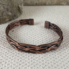 Intricate handmade braided copper cuff. Wears well with all sleeve lengths. Cuff width: 3/8 inch. Copper Jewelry Handmade Cuff Bracelets, Handmade Cuff Bracelets, Frit Painting, Copper Earrings Handmade, Unique Handcrafted Jewelry, Copper Jewelry Handmade, Copper Cuff, Ancient Jewelry, Wrist Cuffs