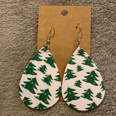 Attention All Christmas Lovers! These Super Lightweight Earrings Are Exactly What Your Collection Needs. Why Limit Christmas To One Day A Year When These Are Perfect The Other 364 As Well! The Faux Leather Material Will Have You Forget You’re Wearing Them Until Someone Stops To Ask Where You Got Them! Did I Mention The Print Is On Both Sides?! Win! Brand New, Never Worn Make Sure To Check Out My Other Items And Bundle Because I Looooove Discounting Bundles For Multiple Items! Faux Leather Ideas, Gold Ear Crawlers, Tree Faux, Givenchy Earrings, Elephant Earrings, Silver Elephants, Christmas Lovers, Coin Earrings, Faux Leather Earrings