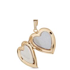 Our 14K yellow gold locket is tailor-made for the little treasures you always want close to the heart. This heart-shaped, hand engraved locket is meticulously crafted for a lifetime of wearing and honors a timeless tradition in fine jewelry making. It’s the perfect gift for yourself or someone you love. Engraved Locket, Gold Locket, Hand Engraving, Custom Engraving, Locket, Types Of Metal, Gold Metal, Heart Shapes, Fine Jewelry