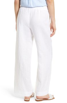 Crafted from lightweight linen, these tie-waist pants feature breezy wide legs for vacation-ready vibes. 31" inseam; 11" leg opening; 11 1/2" front rise; 16 1/2" back rise 100% linen Machine wash, tumble dry Imported Relaxed White Linen Bottoms, Straight Leg Linen Bottoms For Beach Season, White Linen Pants For Beach, White Linen Pants For The Beach, White Linen Wide Leg Vacation Pants, White Linen Wide Leg Casual Pants, White Linen Wide Leg Pants For Vacation, White Linen Wide-leg Pants, Casual White Linen Wide Leg Pants