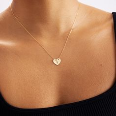 "Diamond Heart 14k Solid Gold Necklace is the best gift for the one whom your heart belongs. Let the one you love know about your love with the 14k solid gold heart necklace. It's not the Choose the perfect birthday, an anniversary or just a random Friday to cherish your love. F E A T U R E S * Made to Order. * Gold KT: 14K * Choice of Gold Color: Yellow Gold, Rose Gold, White Gold * Gem Stone: Genuine Diamond * Diamond-Cut: Round * Diamond Carat: 0.01 ct * Pendant Height: 9 mm / 0.35 inch * Pen Everyday Yellow Gold Heart Cut Charm Necklace, Sterling Silver Charm Necklace With Heart Pendant, 14k Gold Tarnish-resistant Heart Necklace Gift, 14k Gold Heart Necklace Tarnish Resistant For Gift, Everyday Yellow Gold Heart Necklace In Sterling Silver, 14k Gold Heart Initial Pendant Necklace For Anniversary, Yellow Gold 14k Initial Pendant Heart Necklace, Yellow Gold Engraved Heart Necklace, Dainty Engraved Heart Necklace In 14k Gold