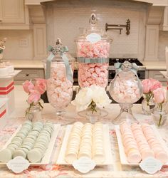 a table filled with lots of desserts and sweets