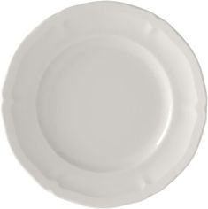 an empty white plate on a white background