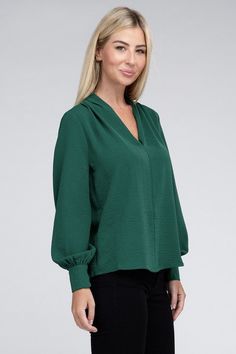 Elevate your wardrobe with our Woven Airflow V-Neck Long Sleeve Top, a versatile piece that effortlessly combines style and comfort. This top features a flattering V-neckline that adds a touch of sophistication to your look. The ruched shoulder detail adds a hint of texture and elevates the overall design. Made from breathable woven fabric, it ensures comfort throughout the day while keeping you looking chic.PRODUCT SPECIFICATIONS*100% Polyester*Machine wash cold, gentle cycle, tumble dry low.*M Effortless Chic, Sheer Fabrics, Tee Shop, Dress Accessories, Short Tops, Long Sleeve Top, Plus Size Dresses, Woven Fabric, Going Out