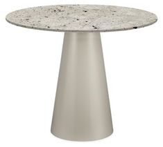 an image of a table that is made out of marble and silver colored material with black dots on the top