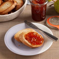 a plate with bread and jam on it