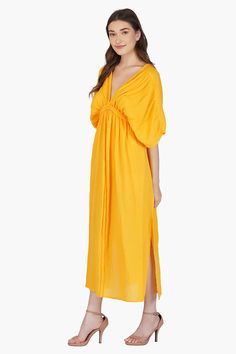 This gorgeous Amber Cotton Dobby Maxi Dress is the perfect way to add a touch of elegance to your wardrobe. The 100% cotton dobby fabric is lightweight, breathable, and textured for a luxurious feel. The kaftan sleeves, pleated detailed top, and free flow skater skirt make this dress stylish yet comfortable. The unique design features a hand-braided fabric belt under the bust and braided neckline for extra detail. The waist tie belt is easy to adjust for the perfect fit. Textured 100% cotton dob Kaftan Sleeves, Braided Fabric, Dobby Fabric, Dress Stylish, Fabric Belt, Bag Dress, Tie Belt, Stylish Dresses, Waist Tie