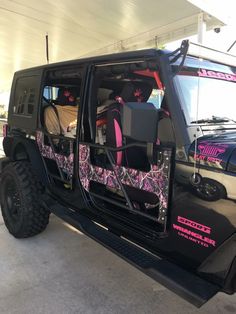 the jeep is decorated with pink camo