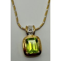 This is part of Chairish’s Fine Jewelry assortment.  14k Yellow Gold & Peridot Pendant & Necklace. Weight: 5 grams Weight of Chain: 3.2 grams Weight of Pendant: 1.8 grams  Chain Lth: 16 in.  Peridot: approx. 8.09 mm x 6.27 mm Gold Necklace With Peridot For Formal Occasions, Formal Yellow Gold Peridot Jewelry, Gold Peridot Necklace For Formal Occasions, Formal Yellow Gold Peridot Necklaces, Formal Yellow Gold Peridot Necklace, Formal Peridot Gemstone Necklaces, Peridot Necklace Pendant, Luxury Yellow Gold Peridot Necklace, Formal Peridot Pendant Necklace