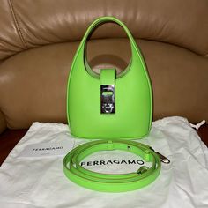 Price Is Firm Brand New With Dust Bag And Box Green Calf Leather/Goatskin Gancini Buckle 6.5”W * 3.5”D * 9.25”H (Including Handle) Salvatore Ferragamo Bags, Hobo Crossbody Bag, Green Leather, Leather Mini, Salvatore Ferragamo, Calf Leather, Dust Bag, Crossbody Bag, Buckle