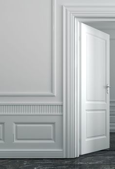 an open door in a white room with marble flooring