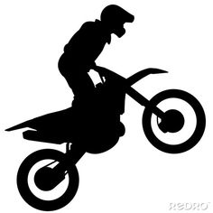 a person on a dirt bike in the air