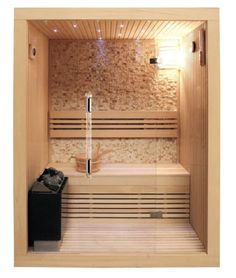 a wooden sauna with two benches and a trash can