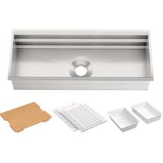 stainless steel kitchen sink and accessories including cutting board